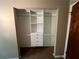 Walk-in closet complete with adjustable shelving and drawers at 2705 Rhoanoke Dr, Duluth, GA 30096