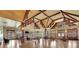 Large gathering space with high vaulted ceilings, exposed beams, and abundant natural light at 3250 Seven Oaks Dr, Cumming, GA 30041