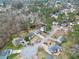 Aerial view of a residential neighborhood showcasing well-maintained homes, mature trees, and a quiet cul-de-sac at 4608 Rosemear Ct, Norcross, GA 30093