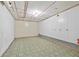 Unfinished basement with concrete floors and white paneled walls at 4608 Rosemear Ct, Norcross, GA 30093