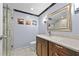 Bathroom with glass shower, modern vanity, and marble floors at 4608 Rosemear Ct, Norcross, GA 30093