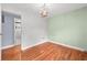 Bedroom with chandelier and hardwood flooring at 4608 Rosemear Ct, Norcross, GA 30093