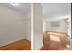 The bedroom features hardwood floors and a closet with wire shelving at 4608 Rosemear Ct, Norcross, GA 30093