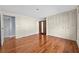 The bedroom has hardwood floors and built in closet storage at 4608 Rosemear Ct, Norcross, GA 30093