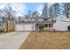 Charming two-story home with a two-car garage and covered front porch at 4608 Rosemear Ct, Norcross, GA 30093