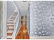 Inviting hallway with hardwood floors and a staircase leading to the upper level at 4608 Rosemear Ct, Norcross, GA 30093
