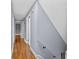 Hallway with neutral paint and hardwood floors at 4608 Rosemear Ct, Norcross, GA 30093