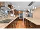 Modern kitchen featuring stainless steel appliances, granite countertops, and a stylish backsplash at 4608 Rosemear Ct, Norcross, GA 30093