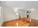 Large room featuring hardwood floors and natural light at 4608 Rosemear Ct, Norcross, GA 30093