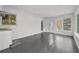 Room featuring modern design elements, hardwood floors and ample natural light at 4608 Rosemear Ct, Norcross, GA 30093