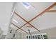 High beamed ceilings with skylights and ceiling fans at 605 Ga 120 Hwy, Roswell, GA 30075