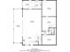First floor layout plan showcases a spacious living room, dining area, kitchen, and bedroom at 605 Ga 120 Hwy, Roswell, GA 30075