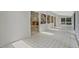 Bright open floor plan, with tiled flooring, skylights, and abundant natural light creates an inviting atmosphere at 605 Ga 120 Hwy, Roswell, GA 30075