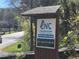 Sign indicating the Chattahoochee Nature Center, inviting visitors to 'Get Your Nature On' at 605 Ga 120 Hwy, Roswell, GA 30075