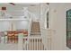 Staircase and wet bar with barstool seating at 605 Ga 120 Hwy, Roswell, GA 30075