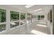 Sunroom with floor-to-ceiling windows at 605 Ga 120 Hwy, Roswell, GA 30075
