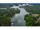 Stunning aerial view of Lake Keowee surrounded by lush trees and multiple docks with lake access at 2865 Chattahoochee Rd, Cumming, GA 30041