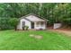 Charming single-story home featuring a well-maintained lawn and inviting entrance, surrounded by lush trees at 2865 Chattahoochee Rd, Cumming, GA 30041