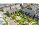 Aerial view of modern townhomes with private back patios and green spaces at 6645 Cortland Walk, Alpharetta, GA 30005