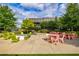 Vibrant outdoor seating area, perfect for socializing and enjoying the community atmosphere at 6645 Cortland Walk, Alpharetta, GA 30005