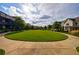 Expansive green space surrounded by well-maintained homes, perfect for outdoor activities and community events at 6645 Cortland Walk, Alpharetta, GA 30005