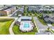 Beautiful community pool with seating area surrounded by upscale townhomes and green spaces at 6645 Cortland Walk, Alpharetta, GA 30005