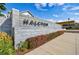 Halcyon community sign is surrounded by lush landscaping and welcoming environment, a great place to live at 6645 Cortland Walk, Alpharetta, GA 30005