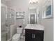 Bathroom with glass shower, modern vanity and decor at 2720 Garonne Way, Cumming, GA 30041