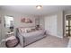Bedroom with daybed, window and decor at 2720 Garonne Way, Cumming, GA 30041