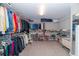 Spacious walk-in closet with ample shelving and hanging space for organized storage at 2720 Garonne Way, Cumming, GA 30041