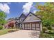 Beautiful two-story home featuring a landscaped yard and an attached two-car garage at 2720 Garonne Way, Cumming, GA 30041
