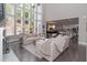 Spacious living room with a fireplace, soaring ceilings, and an open floor plan at 2720 Garonne Way, Cumming, GA 30041