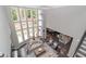 Spacious living room with high ceilings and large windows overlooking the yard at 2720 Garonne Way, Cumming, GA 30041