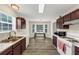 Eat-in kitchen features updated appliances, bright windows and lovely bay window dining nook at 2880 Field Spring Dr, Lithonia, GA 30058