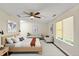 Spacious main bedroom featuring natural light and a cozy sitting area at 2880 Field Spring Dr, Lithonia, GA 30058