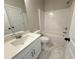 Modern bathroom showcasing a white vanity and sleek fixtures at 5700 Urban Village Way # 1, Tucker, GA 30084