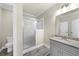 Bathroom features neutral walls, stand-up shower with glass surround and stylish vanity at 885 Old Peachtree Ne Rd, Lawrenceville, GA 30043