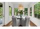 Cozy breakfast nook with natural light, neutral color scheme, and outdoor views at 885 Old Peachtree Ne Rd, Lawrenceville, GA 30043