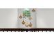 Staircase featuring decorative pendant lights, large arched window and view of exterior at 885 Old Peachtree Ne Rd, Lawrenceville, GA 30043