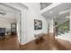 Spacious foyer showcasing hardwood floors, natural light, and staircase, offering an elegant entrance to the home at 885 Old Peachtree Ne Rd, Lawrenceville, GA 30043