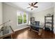 Cozy home office with a large window offering natural light and a view of the outdoors at 885 Old Peachtree Ne Rd, Lawrenceville, GA 30043