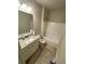 Bright bathroom features granite vanity and shower-tub combo at 100 Ruby Ln, Mcdonough, GA 30252