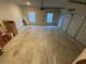 Spacious garage with overhead door and window for natural light at 100 Ruby Ln, Mcdonough, GA 30252