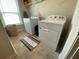 Clean laundry room with washer and dryer at 100 Ruby Ln, Mcdonough, GA 30252