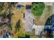 Overhead view of a single-Gathering home with a large backyard, driveway, and mature landscaping at 2103 Columbia Dr, Decatur, GA 30032