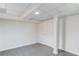 Finished basement featuring clean, white walls, new flooring, and neutral-colored trim at 2103 Columbia Dr, Decatur, GA 30032