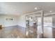 Bright, open-concept living room and kitchen space with hardwood floors and plenty of natural light at 2103 Columbia Dr, Decatur, GA 30032