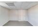 A finished room boasts neutral walls, a tiled ceiling, and stylish wood-look flooring at 2103 Columbia Dr, Decatur, GA 30032