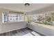 Sunroom featuring many windows with views of the outdoors at 2103 Columbia Dr, Decatur, GA 30032