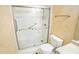 This bathroom features a step in shower, grab bars, and tile flooring at 2840 General Lee Way, Buford, GA 30519